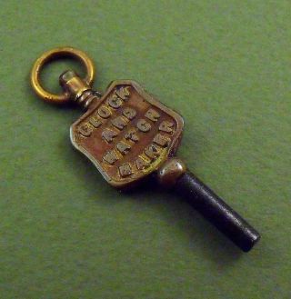Antique Advertising Brass & Metal Fob Pocket Watch Key - J.  W.  Benson Ludgate