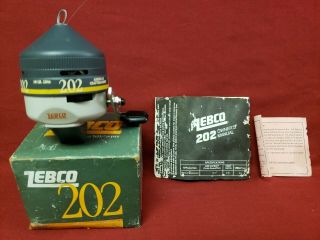 Vintage Zebco 202 Medium Freshwater Fishing Reel W Box & Papers Old Stock