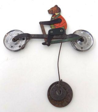 Antique Teddy Roosevelt Teddy Bear On Bicycle Metal String Toy