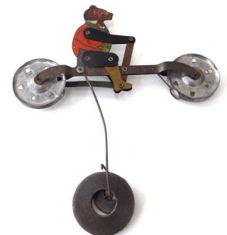 Antique Teddy Roosevelt Teddy Bear on Bicycle Metal String Toy 2