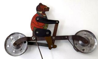 Antique Teddy Roosevelt Teddy Bear on Bicycle Metal String Toy 3