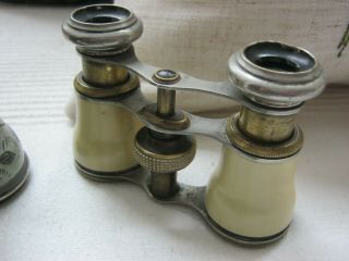 3 pairs of antique and vintage opera glasses. 2