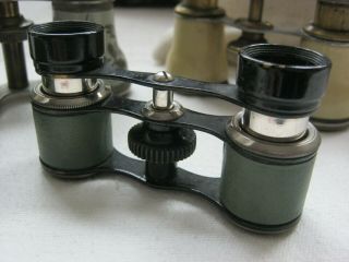 3 pairs of antique and vintage opera glasses. 3