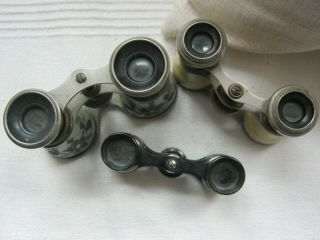 3 pairs of antique and vintage opera glasses. 5