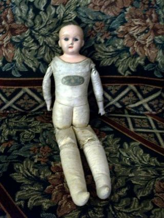 Tin Head German Doll With Labeled Leather Body