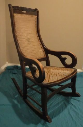 Antique 19th C Solid Wood Lincoln Rocking Chair w Caned Seat & Back Carved Top 2