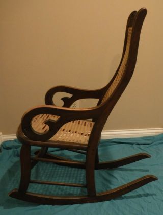 Antique 19th C Solid Wood Lincoln Rocking Chair w Caned Seat & Back Carved Top 5