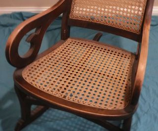 Antique 19th C Solid Wood Lincoln Rocking Chair w Caned Seat & Back Carved Top 7