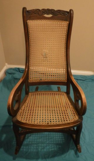 Antique 19th C Solid Wood Lincoln Rocking Chair w Caned Seat & Back Carved Top 8