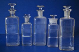 5 Antique/vintage W.  T.  Co.  Apothecary / Medicine / Pharmacy Jars W/ Stopper