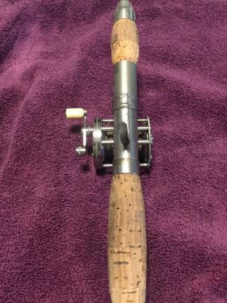 Vintage Quadruple reel on vintage rod base 4
