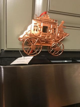 Wells Fargo Stage Coach Christmas ornament.  Copper metal - 5