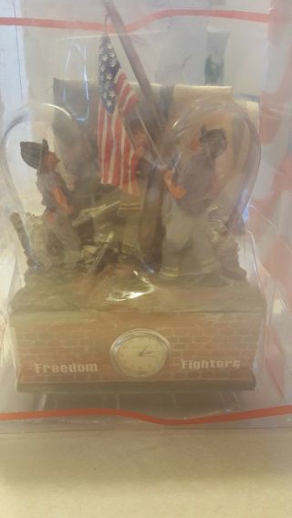 Freedom Fighters 9/11 Figurine With News Paper Picture.
