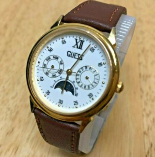 Vintage Guess Mens Gold Tone Moon Phase Quartz Watch Hours Day Date Battery
