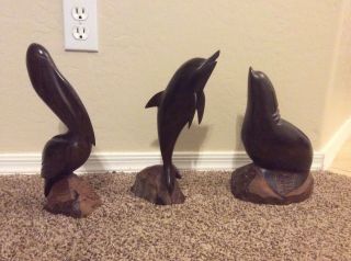 Vintage Ironwood Dolphin,  Pelican And Seal Carved Sculpture