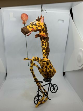 Primitive Handsculpted Papermache Creepy Circus Giraffe Riding Bicycle 9”