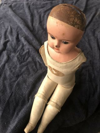 Antique tin head doll leather / oil cloth Violet body Germany label 19 Inch 2