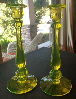 Pair Antique Tall Yellow Green Vaseline Glass Candlesticks