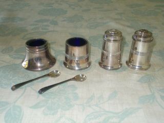 Silver Plated Salt And Pepper Shakes Plus Two Mustard Pots And Spoons