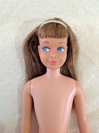 Irresistible Vintage 1964 Brunette Skipper Doll With Metal Hair Band.