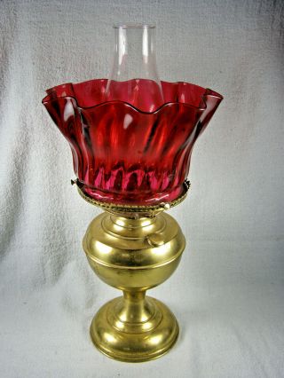 19thc Brass Kerosene Lamp With Ruffled Ruby Glass Shade