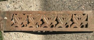 two antique iron heat grates - one with fleur - de - lis motif and one with flowers 2