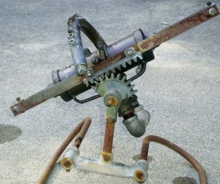 Antique Oscillating Lawn Sprinkler.  Pistons And Gears