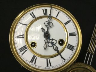 Antique Vienna Clock Movement Including Porcelain Face,  Hands And Pendulum