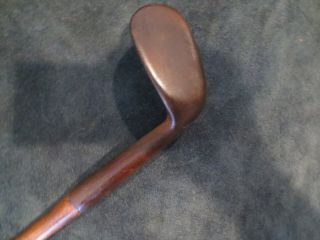 Antique wood shaft hickory T.  Stewart Smooth face Rut niblick 4