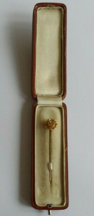 Antique 9ct gold and diamond stick pin in a box and clearly marked ' 9ct '. 3