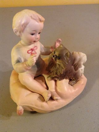 Vintage Antique Early Porcelain Bisque Piano Baby On Pillow W/ Puppy Dog