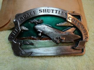 1982 The Space Shuttle Columbia Belt Buckle W/ Green Background