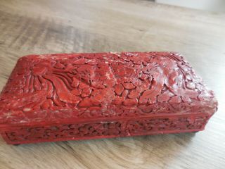 Antique Carved Cinnabar Lacquer Covered Box With Ball Feet