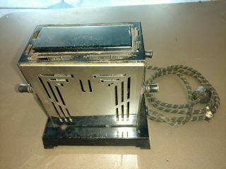 Antique Sterling Toaster By Chicago Manufacturing Company.