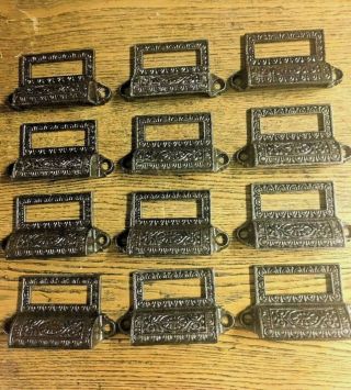 12 Antique Fancy Cast Iron Apothecary Bin/drawer Pulls,  C 1890 
