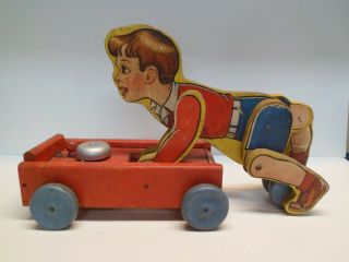 Antique Fisher Price Coaster Boy 140 Pull Toy