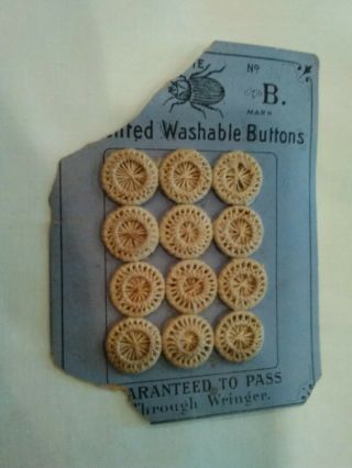 Antique Hand String Buttons On A Card