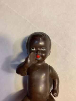 Antique German Black Doll 3 1/2” Plastic jointed doll Marked W GERMANY E.  S. 2