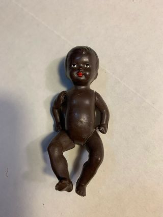 Antique German Black Doll 3 1/2” Plastic jointed doll Marked W GERMANY E.  S. 3