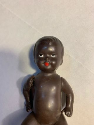 Antique German Black Doll 3 1/2” Plastic jointed doll Marked W GERMANY E.  S. 4