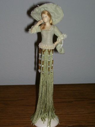 Popular Creations Victorian Green Porcelain Hands And Face Tassel Doll