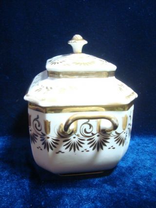 AN ANTIQUE FRENCH PORCELAIN PAINTED SUGAR BOX & COVER. 5