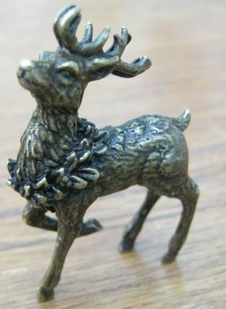 Miniature Bronze Of A Stag / Reindeer With Garland Around Neck