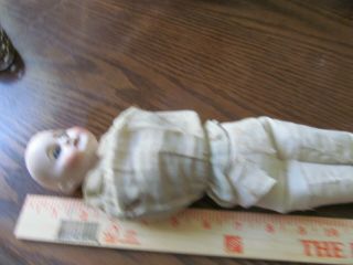 Antique German Bisque Doll,  3 1/2 Inches,  Comes With Vintage Straw Body.