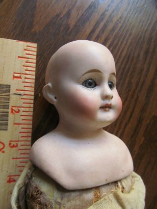 Antique German Bisque Doll,  3 1/2 inches,  comes with vintage straw body. 2