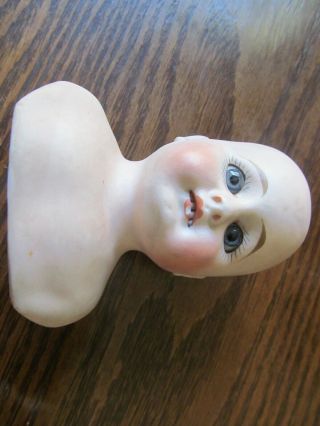 Antique German Bisque Doll,  3 1/2 inches,  comes with vintage straw body. 5