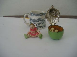 three antique items willow milk jug a metal chicken box a porcelain mini doll 3