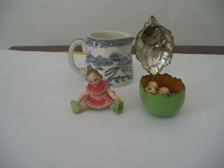 three antique items willow milk jug a metal chicken box a porcelain mini doll 4