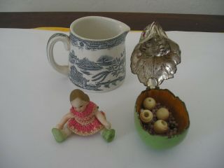 three antique items willow milk jug a metal chicken box a porcelain mini doll 5