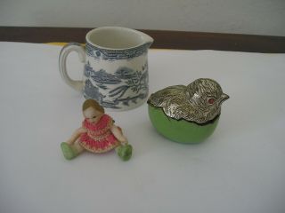 three antique items willow milk jug a metal chicken box a porcelain mini doll 7